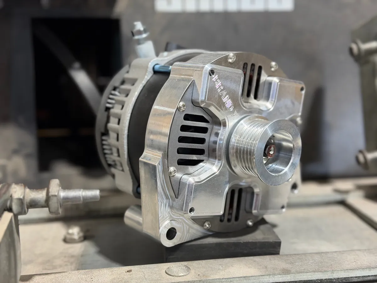 Brand X Electrical 300XL High-Output Alternator - 350A, 14V, compatible with Honda 2.0L engines, serpentine pulley, high-output type - Silver metallic housing, compact build, external fan.